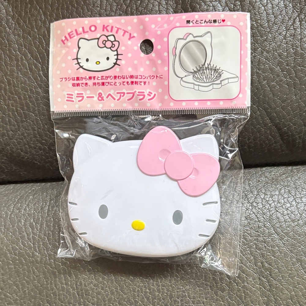 Hello kitty compact mirror and brush